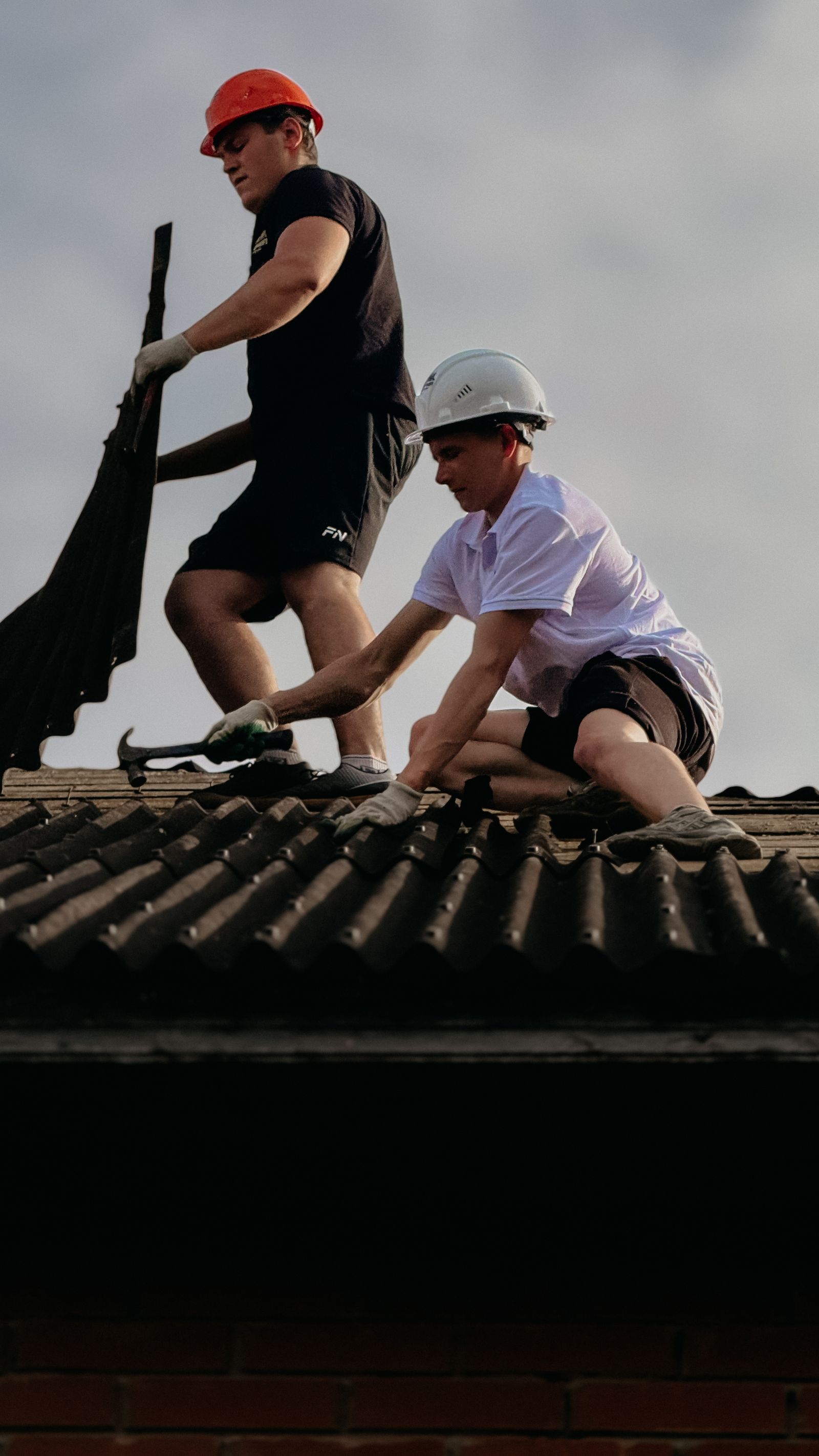 A roofing crew at work on a roof