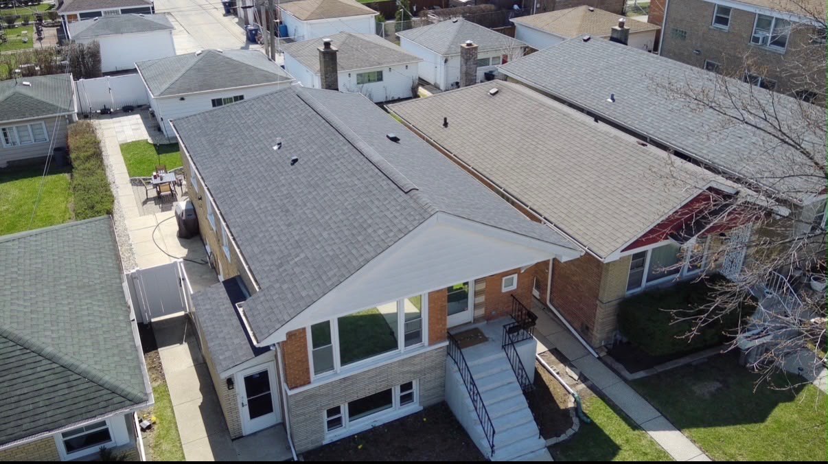 A completed Eagle Star roof on a brick Chicagoland bungalow