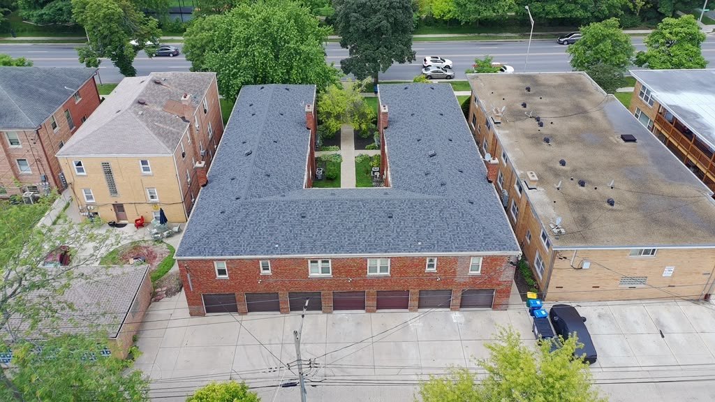 A completed Eagle Star roof on a brick multi-unit building in Greater Chicagoland