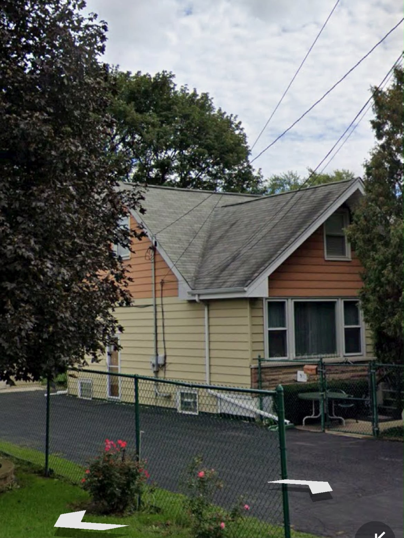 A completed Eagle Star roof on a cream Chicagoland home
