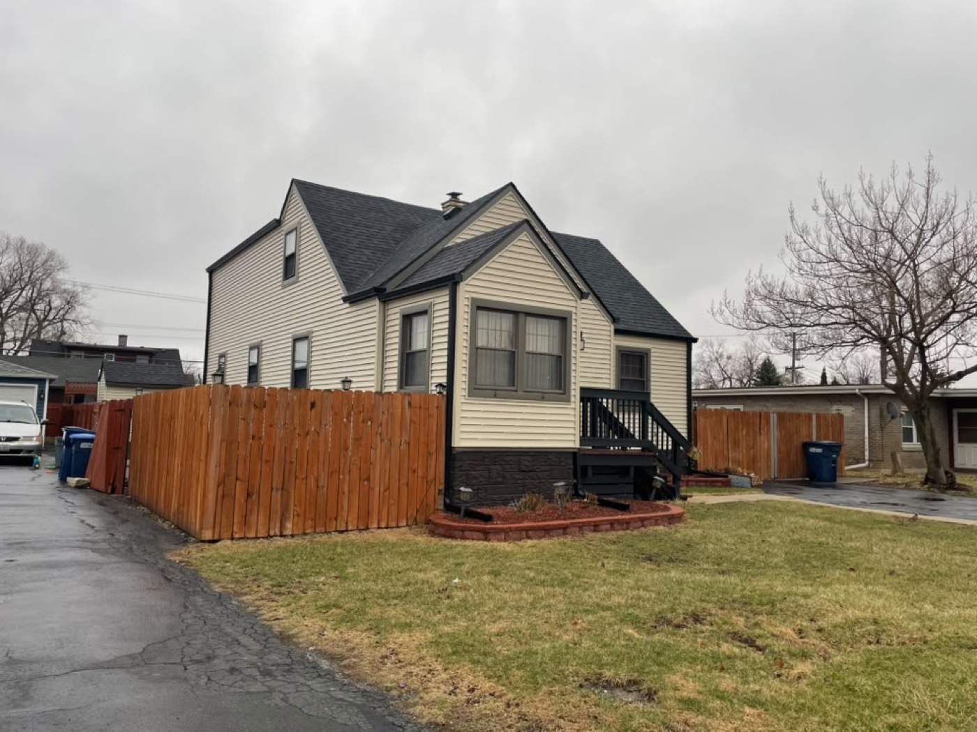 A completed Eagle Star roof on a grey Chicagoland home